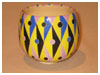 A Bali stoneware geometric design pot, decorated in triagles and circles using vibrant colour glazes - second view.