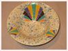 A Bali stoneware bowl, decorated with geometric design and used crystal glaze for background that created random patterns - second view.