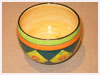 A Bali stoneware jardiniere, decorated with daffodils in diamond shapes and green and orange borders - second view.
