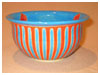 A Bali stoneware jardiniere, decorated with red & blue stripes and pattern inside the bowl - second view.