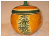 A Bali stoneware jar with lid, decorated with bamboo trees - first view