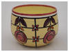 A Bali stoneware bowl decorated with Macintosh style rose design - first view.
