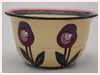 A Bali stoneware bowl, decorated in Macintosh style roses on cream colour background - first view.