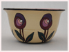 A Bali stoneware bowl, decorated in Macintosh style roses on cream colour background - third view.