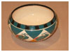 A Bali stoneware small bowl, decorated with peacocks in diamond shapes  - third view.