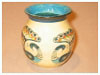 A Bali stoneware small narrow neck peacock jar, decorated with 4 peacocks - third view.